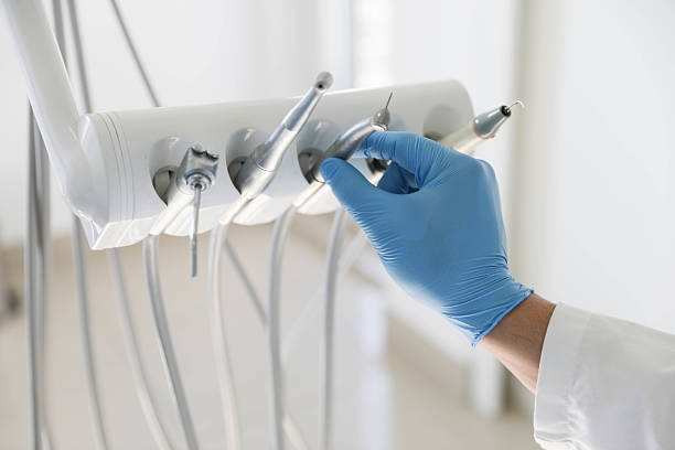 Professional Root Canal Treatment technician working in Elyria, OH